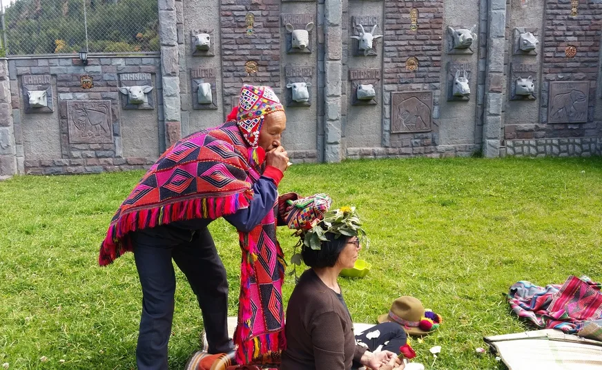 Traditional bath of flowering ceremony in Cusco for spiritual renewal