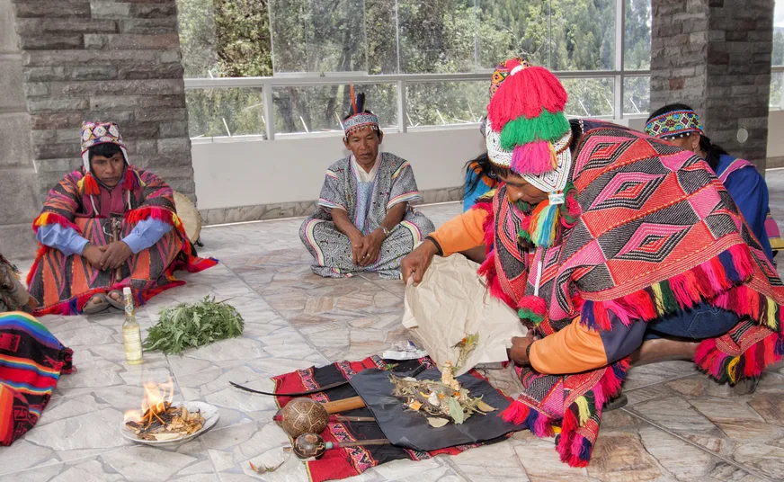 Coca leaf oracle ceremony led by an indigenous healer in Cusco