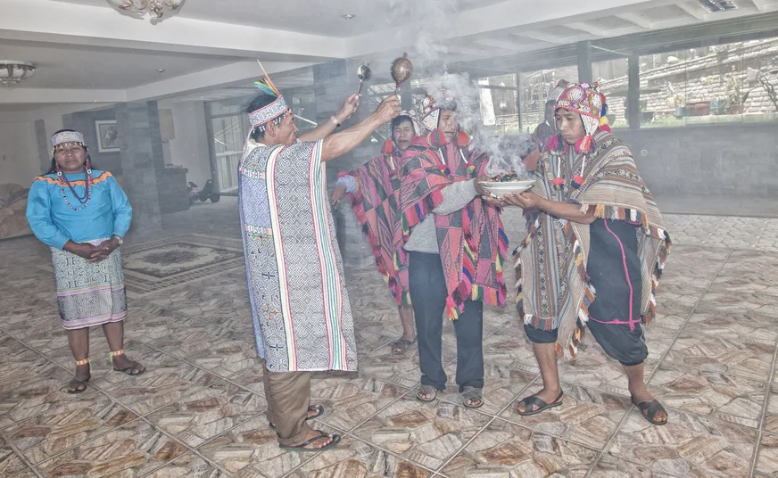 Traditional energy cleansing ritual performed by a shaman in Cusco, Peru