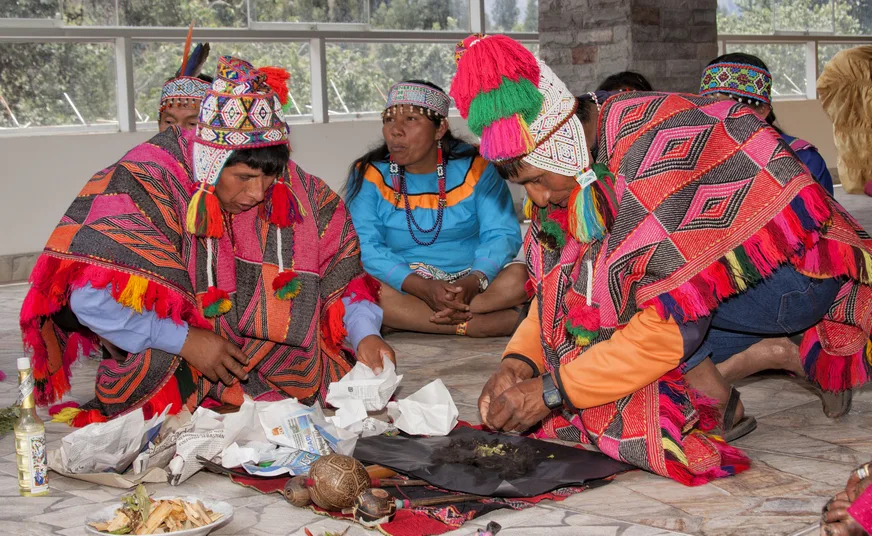 Pachamama ceremony in Cusco with traditional Andean offering
